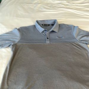 Travis Mathew short sleeve grey and blue golf shirt with stripes